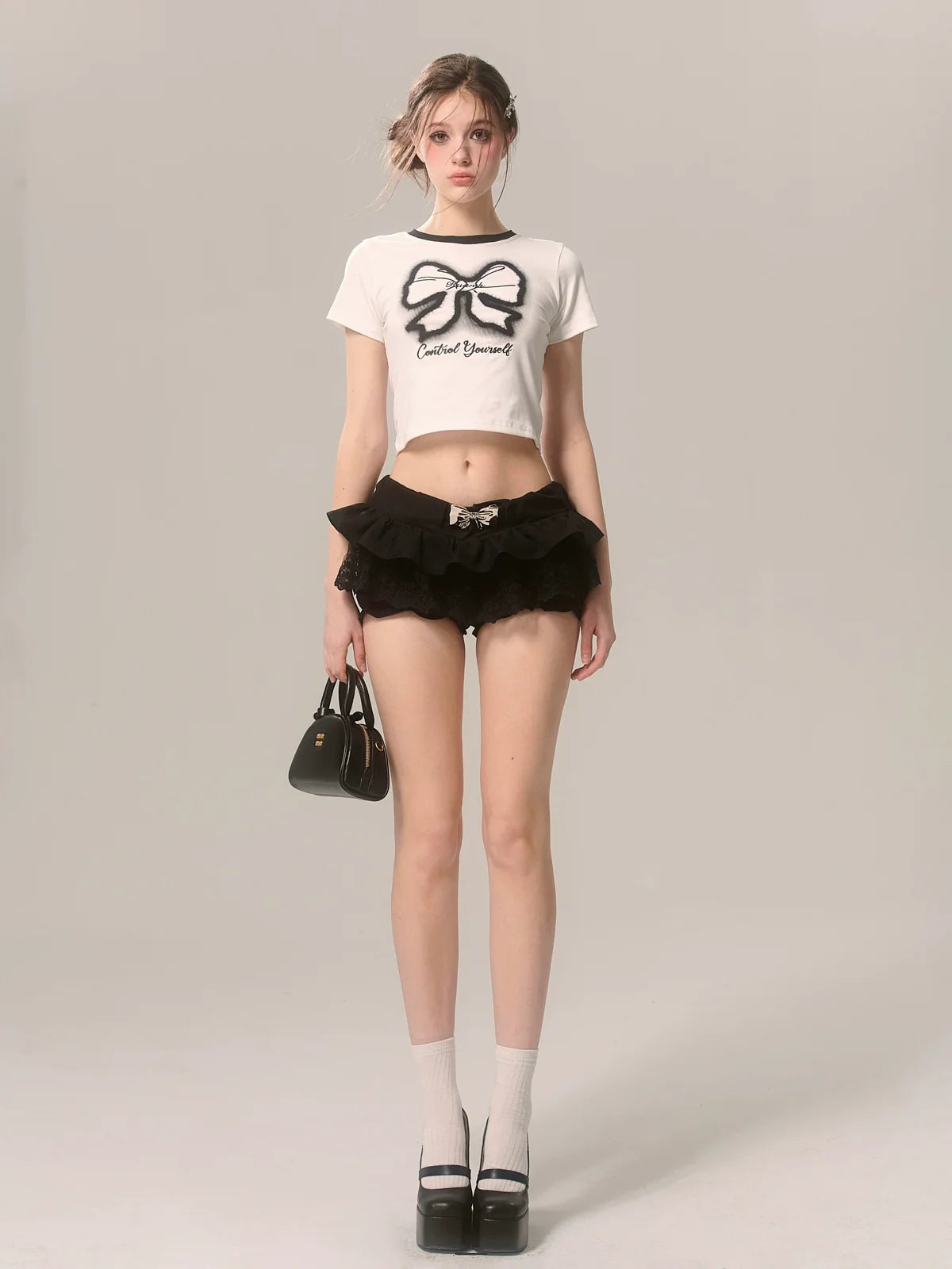 スリムプリントホワイトTシャツリボンショートパンツ