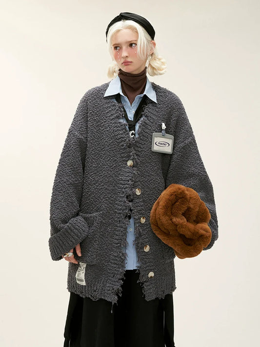 ゆったりとしたロングニットカーディガンセーター