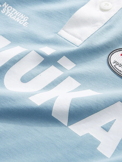 Oberteile Bicolor American Over Logo