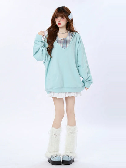 Kariertes Oberteil mit zwei lockeren Kapuzenstücken