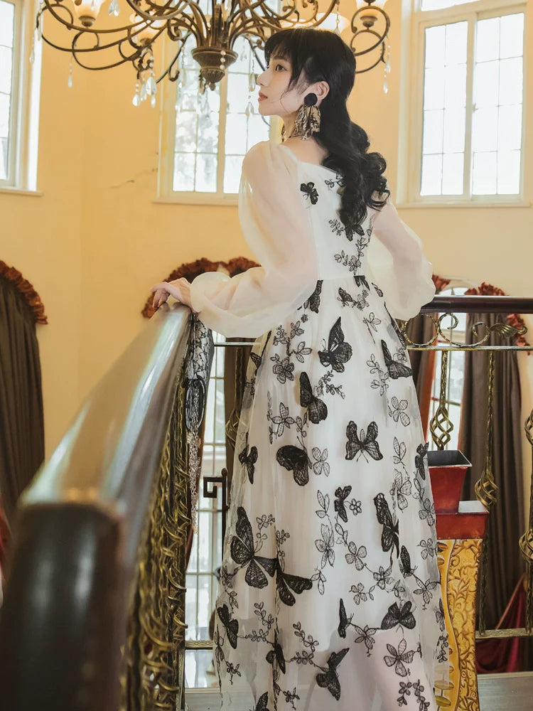 Transparentes Schmetterlings-Chic-Kleid Retro