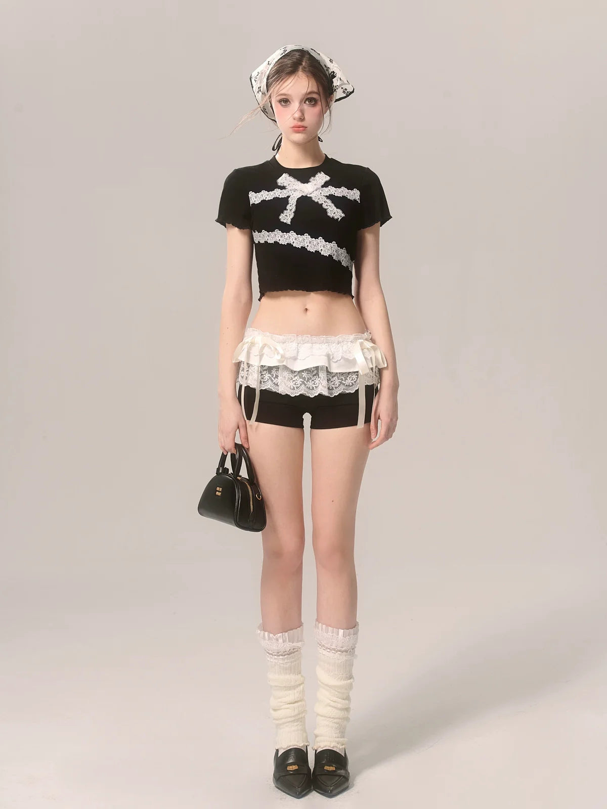 Spitzen-Shorts mit schwarzer Schleife und Nischen-Design