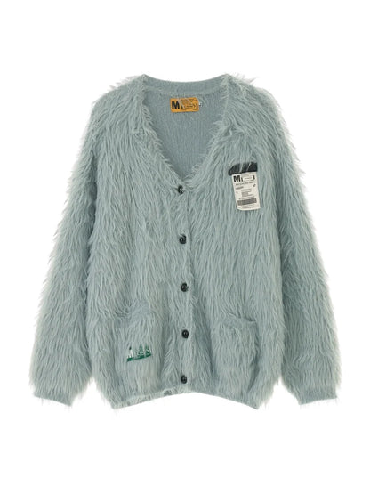 Blaue, zottelige graue Strickjacke