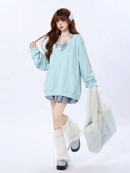 Kariertes Oberteil mit zwei lockeren Kapuzenstücken