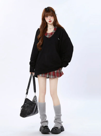 Kariertes Oberteil mit zwei lockeren Kapuzenstücken