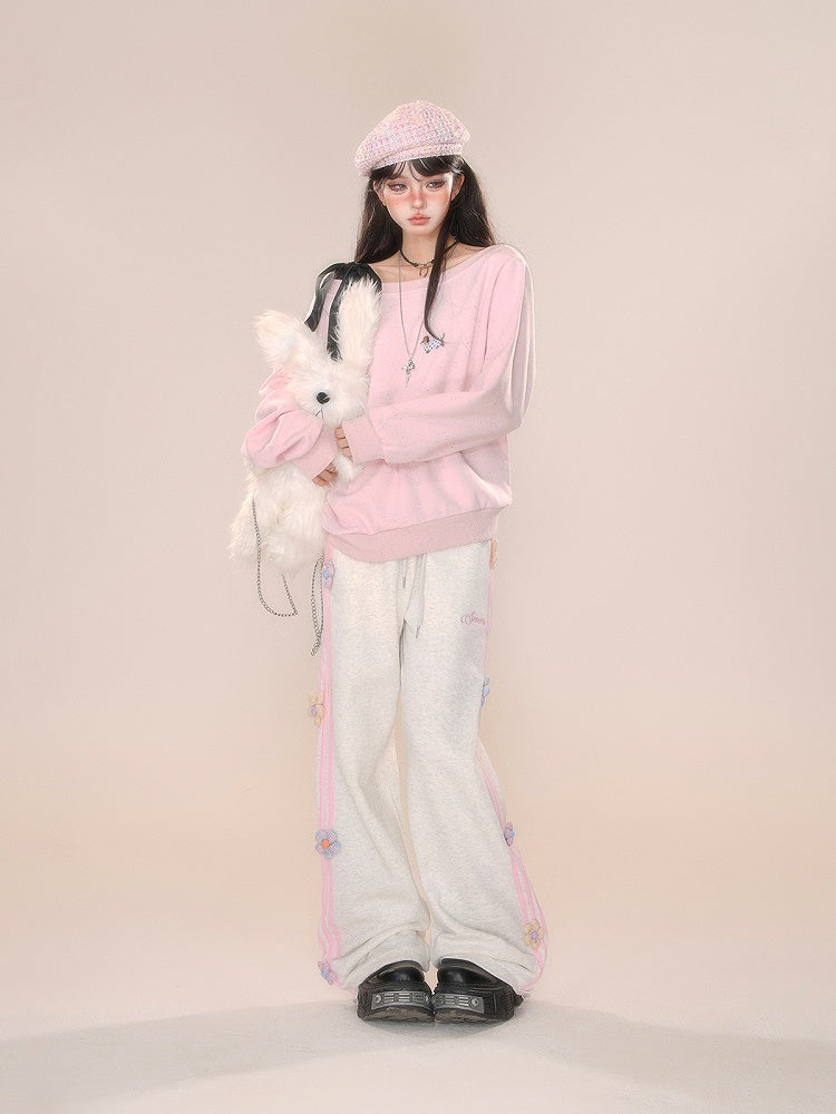 Design Hose mit geradem Bein und Blumenmuster in Grau/Rosa