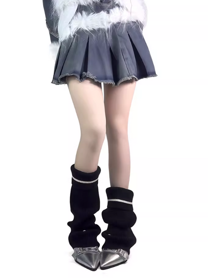 Gestrickte Beinwärmer mit Knopfumschlag