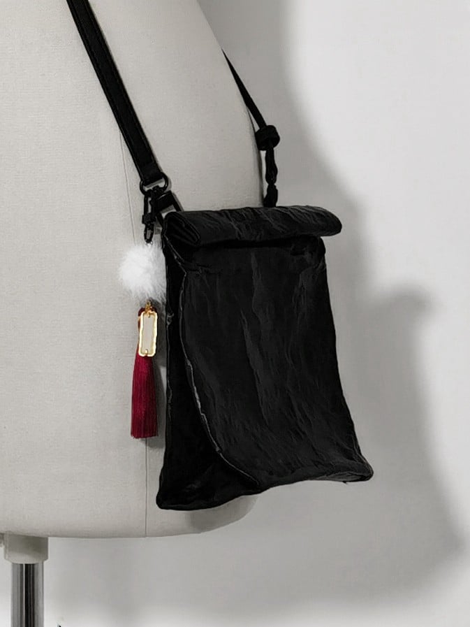 Schwarze Umhängetasche