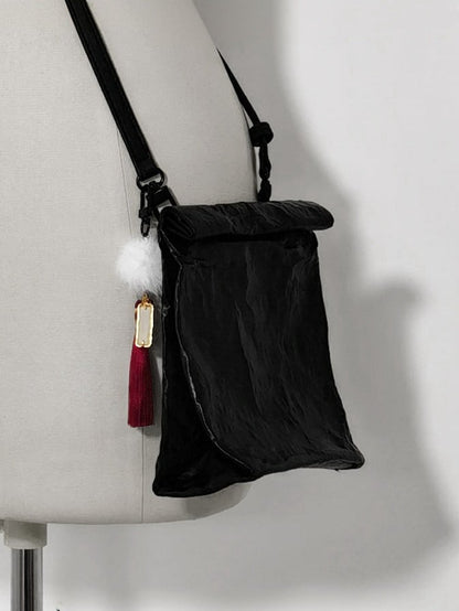 Schwarze Umhängetasche