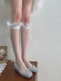 Weiße Unterkneestrümpfe aus Tüll mit Rüschen und Schleife