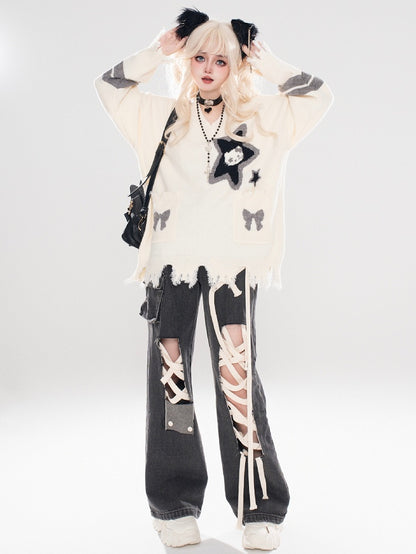 アプリコットキティとスターのディストレストリムVネックセーター