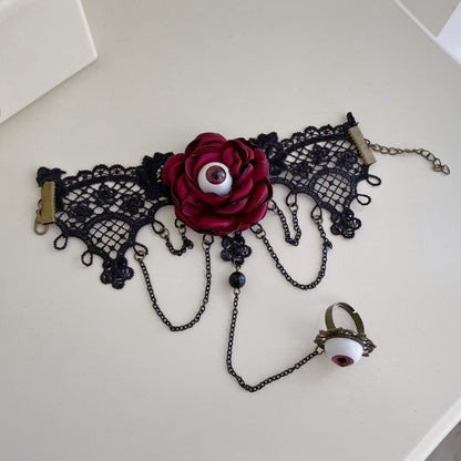 目玉リング付き黒と赤のブレスレット