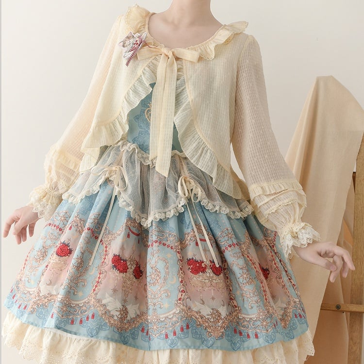 Aprikosenfarbenes Oberteil mit Volantbesatz, Knopfleiste und selbstbindendem Ausschnitt und langen Ärmeln