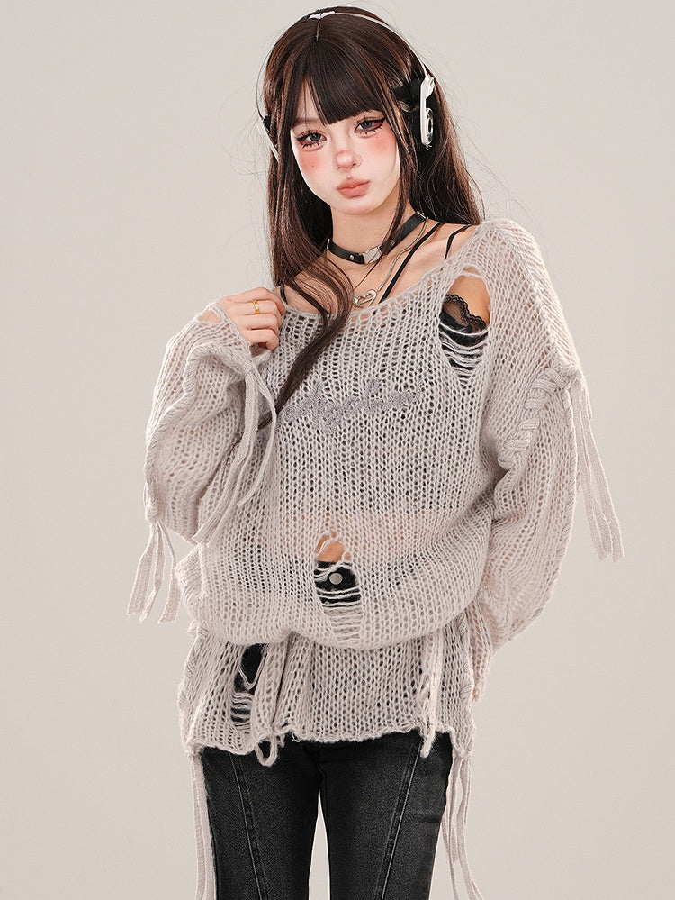 Grau/weißes, halbtransparentes Stricktop mit asymmetrischem Ausschnitt und Löchern im Used-Look