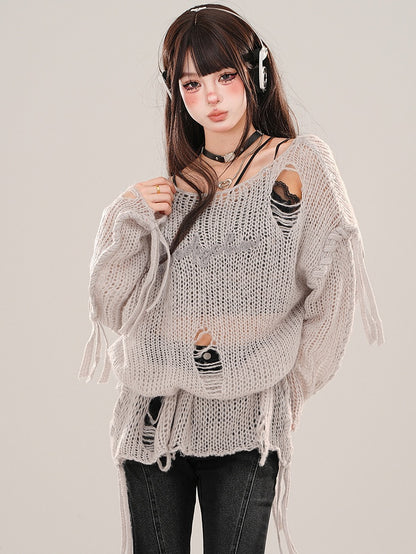 Grau/weißes, halbtransparentes Stricktop mit asymmetrischem Ausschnitt und Löchern im Used-Look