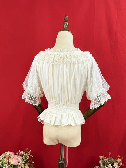 ショート丈伸縮性ブラウス ネックライン アプリコットスリーブ