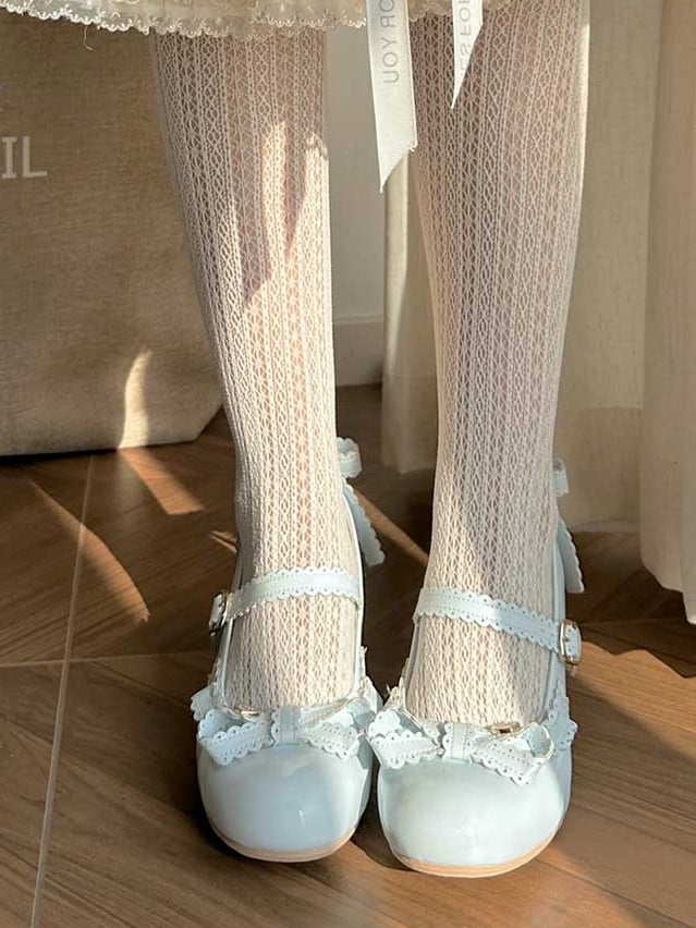 Janes Schleife verziert Mary Blue Top Herz bei