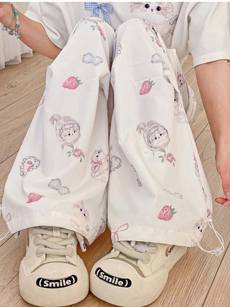 Cuffs – Entzückende weiße Hose mit weitem Bein und Cargotaschen mit Kitty-Print und Kordelzug