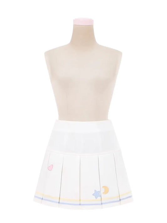 und weiße Plissee-Rockbox mit Stern- und Mondstickerei