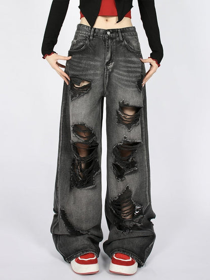 Distressed Wide-Leg Jeans mit verblasster Waschung in Schwarz mit niedriger Taille