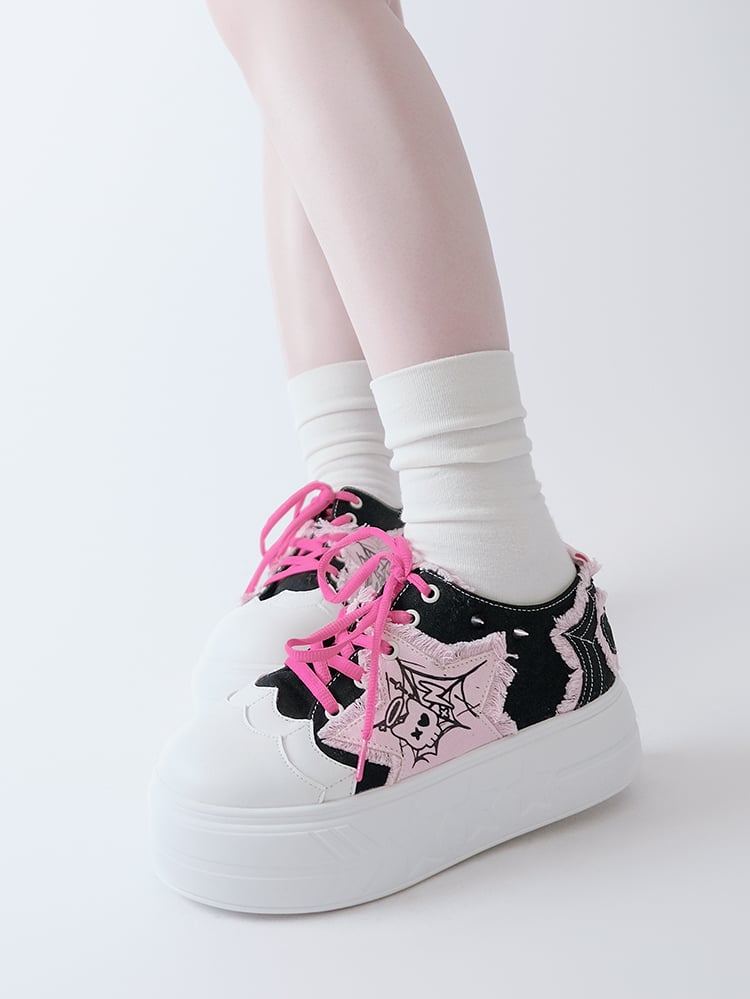 Schwarze und rosa Plateau-Sneaker mit Stern-Applikation