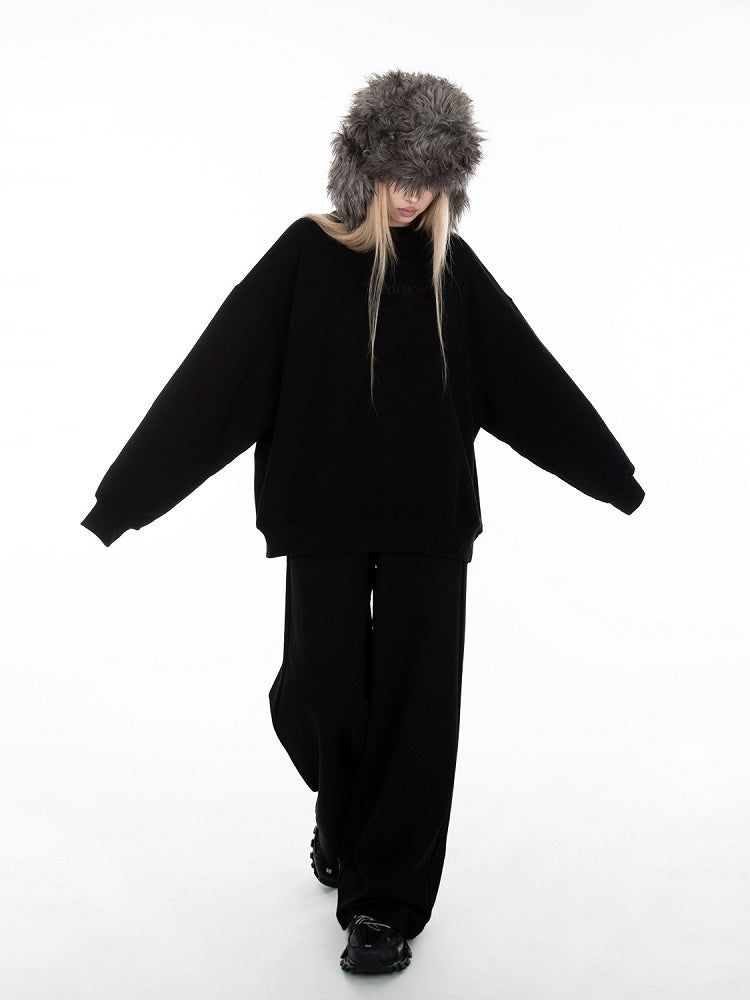 Schwarze, lockere Jogginghose mit weitem Bein und Schlupfdesign