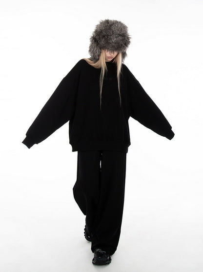 Schwarze, lockere Jogginghose mit weitem Bein und Schlupfdesign