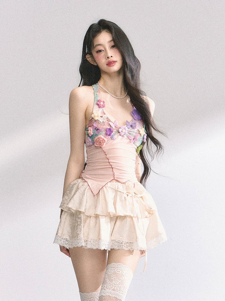 花柄装飾のピンクのレタス裾トップス ニット ホルターネック