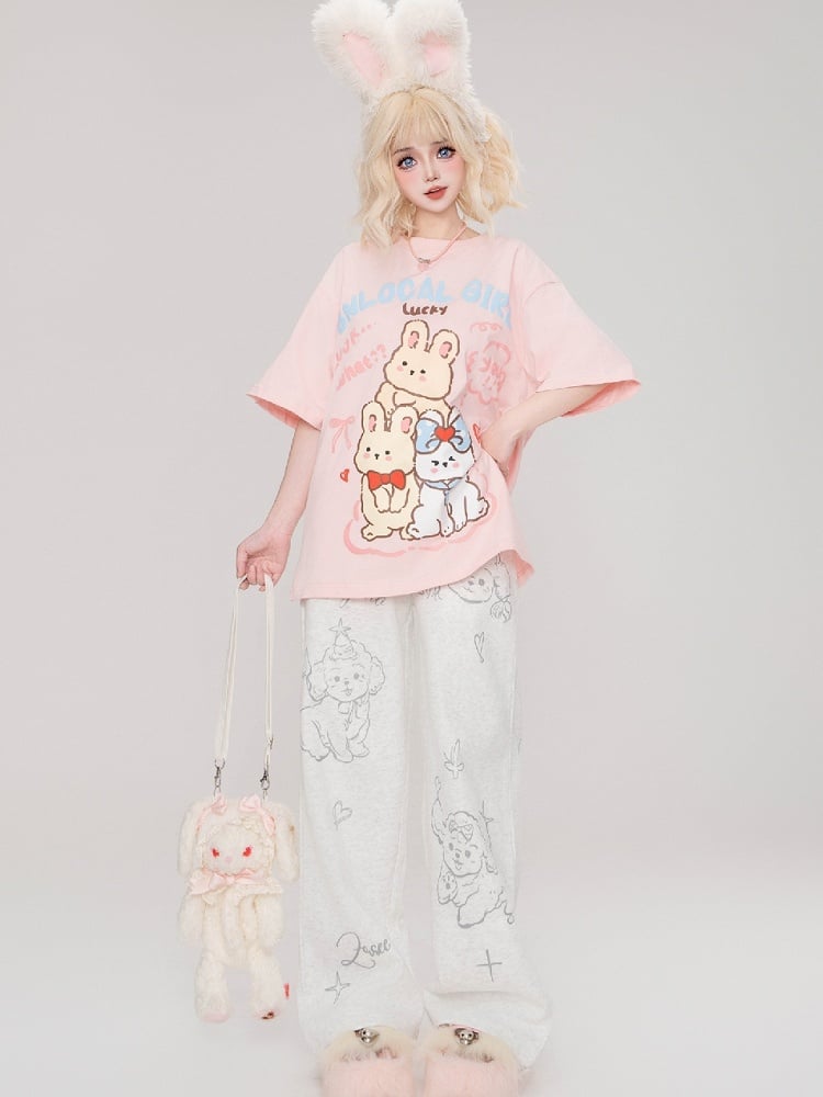 Graue, gerade geschnittene Jogginghose mit Welpen-Print