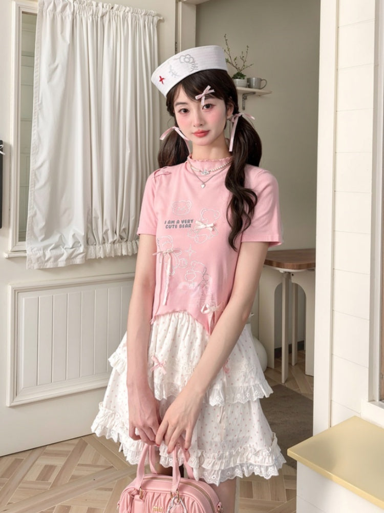 T-Shirt-Saum, gebogen, rosa Rüschen-Ausschnitt, Teddybär-Strasssteine, Schleifen-Akzente