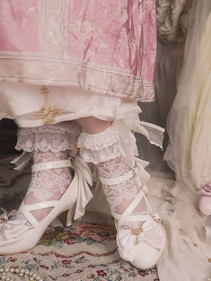 デザイン：ハートにクロスビーズ、トップチャーム、ホワイトリボン