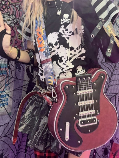 イエロー/レッド/ブラック＆ホワイトのギター型クロスボディバッグ