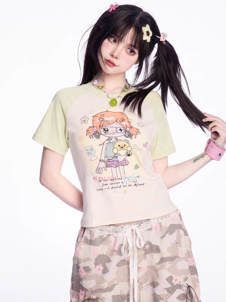 アプリコットとカラーブロックデザインのY2K漫画プリントTシャツ（グリーン）