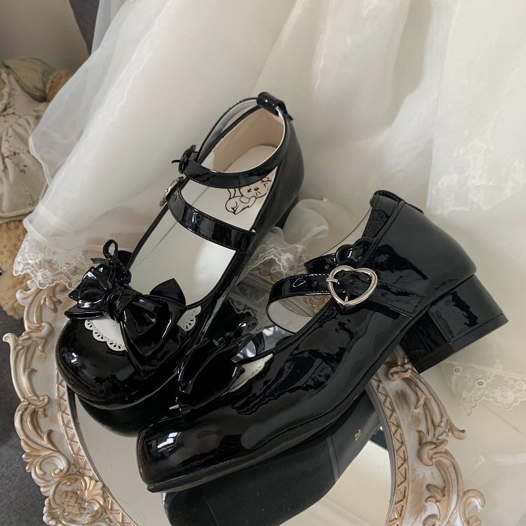 Low-heel Polished White Sweet Lolita Mary Janes - Detachable Buckle Ankle Strap with All Black Heart Snap Design & Bow Accents