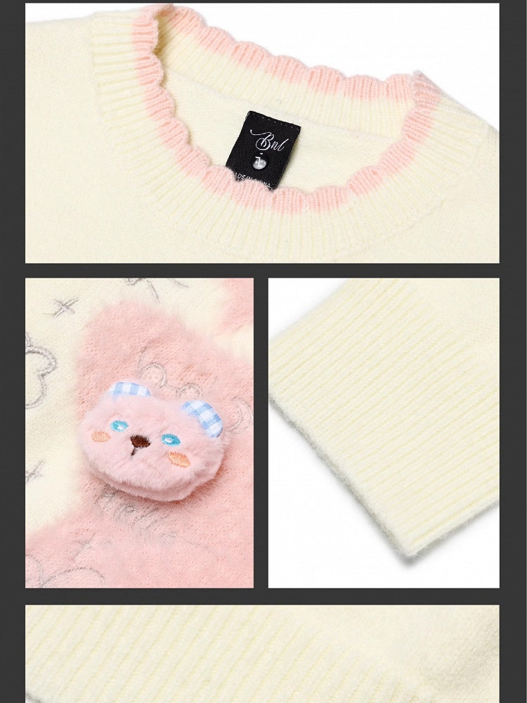 ライトブルー/ライトイエローの星のアップリケがキュートな猫ちゃんをあしらったゆったりセーター