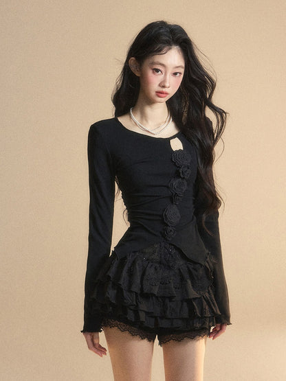 Schwarzes Top mit rundem, glamourösem Detail und gestricktem Halsausschnitt, Blumenverzierung und Cut-Outs