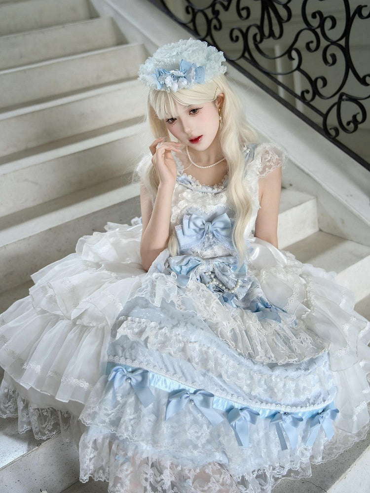 Hime Lolita-Rock mit Schleifen und blaues Hanayome-Stufenkleid mit weißer Dekoration