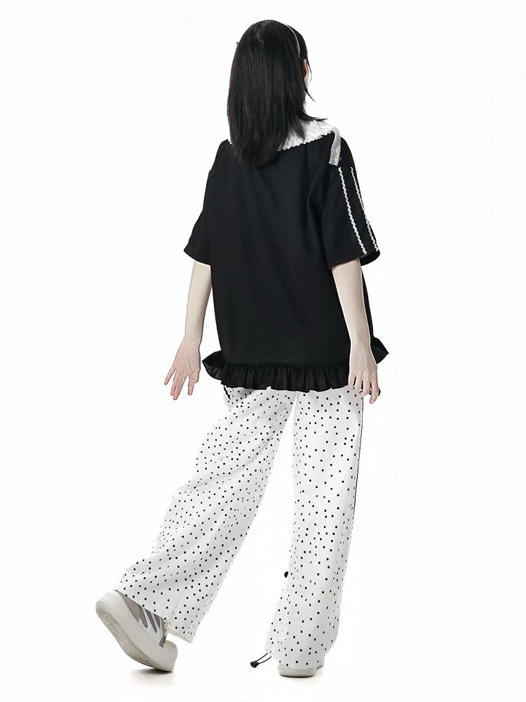 Weiße Baumwollhose mit geradem Bein und Punktemuster und Panda-Plüschtier