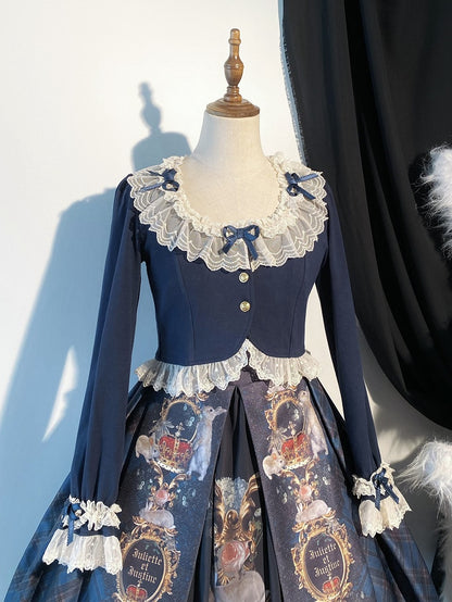 Kurzer, modischer dunkler Cardigan mit Schleife und blauer Spitze