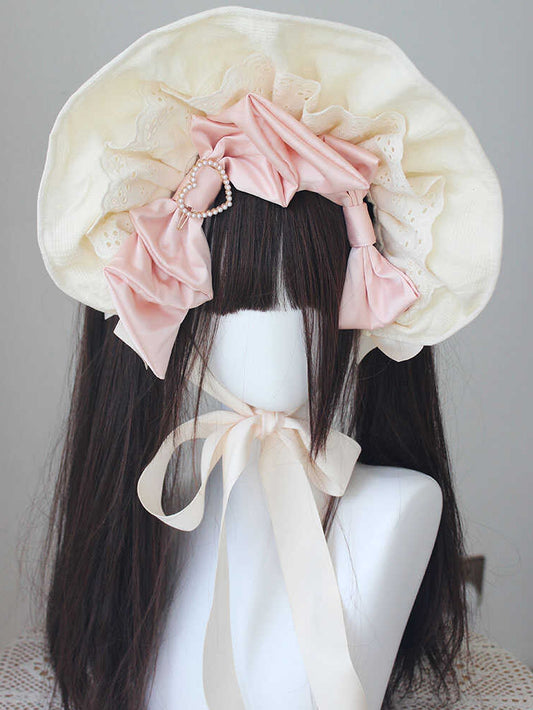 ピンク/ブルーのビーズ付き蝶結びディテール、レーストリムのボンネット