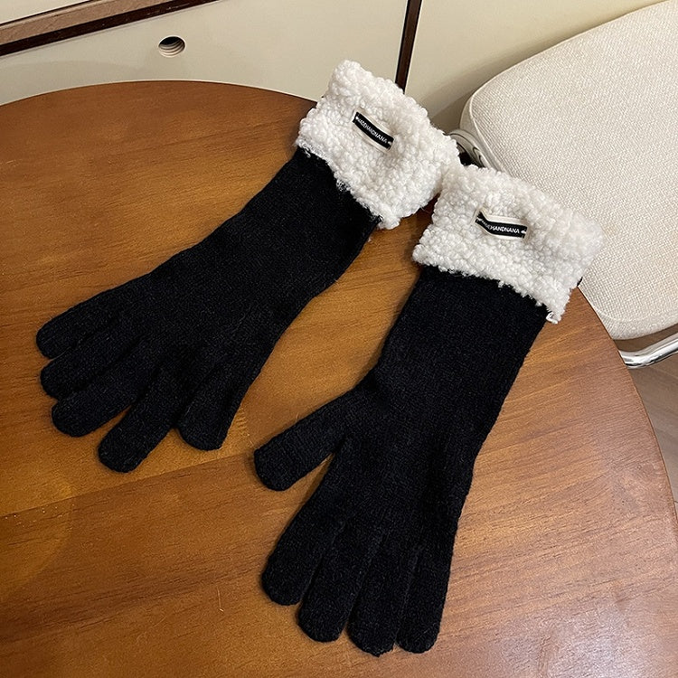 Schwarz/Weiße Plüschhandschuhe