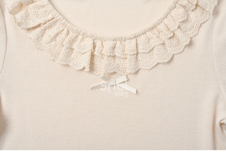 Beiges Slim-Fit-Top mit Spitzenbesatz und Rundhalsausschnitt