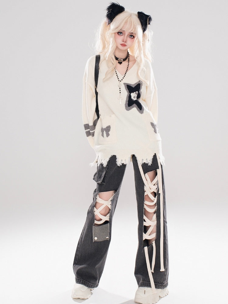 アプリコットキティとスターのディストレストリムVネックセーター