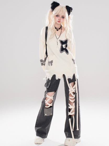 アプリコットキティとスターのディストレストリムVネックセーター