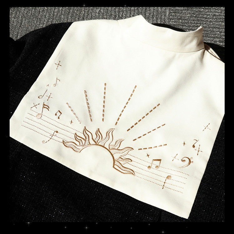 Schwarzes Ouji-Oberteil mit glitzernder Waffelstruktur, Musiknoten und Fransenschärpe