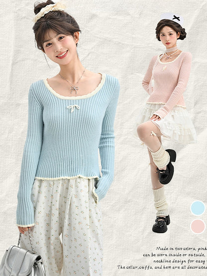 Blaues, schmal geschnittenes Strickoberteil mit Rundhalsausschnitt und Schleifendetails