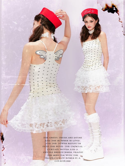 ベージュ オールオーバーデザイン バックキャミトップ 蝶結びプリント ウィング