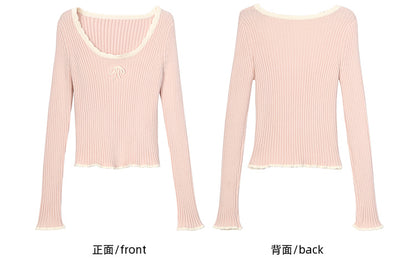 Rosa Strickoberteil mit Rundhalsausschnitt und schmaler Passform