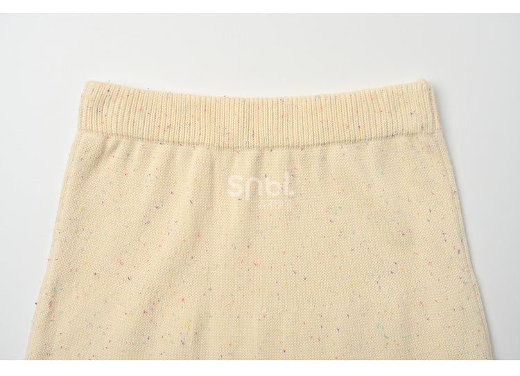 イエローのリボンがアクセントのハイウエストニットミディ丈スカート