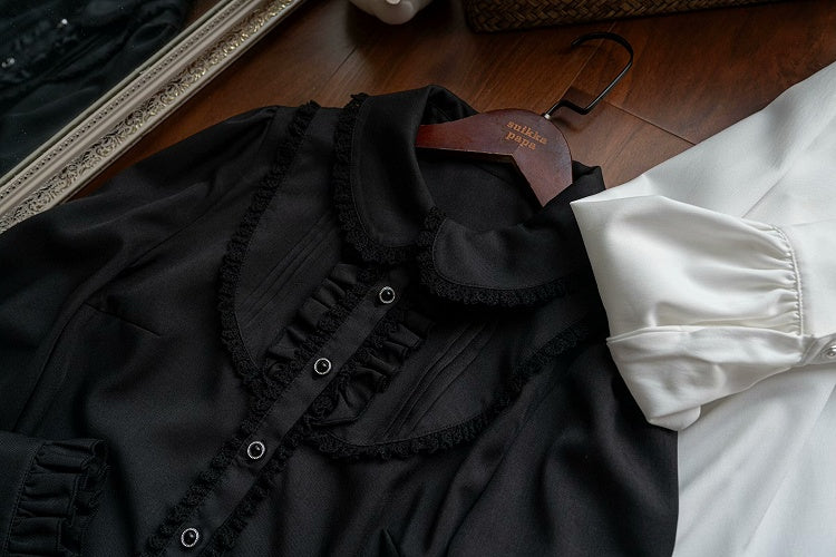 ブラックのラウンドフラットカラー長袖シャツ